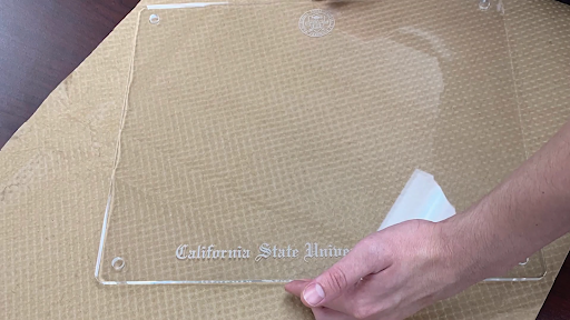 how to insert your diploma inside lucent frame step 2